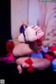 A close up of a baby's feet on a bed.